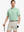 Model wearing Modern Texture Stylish Polo in BERYL GREEN, front half-body view holding golf club.