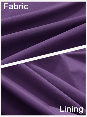 Close-up texture of dark purple women's stretch a-line golf skort with 7 pockets fabric showing detailed outer and inner lining material.