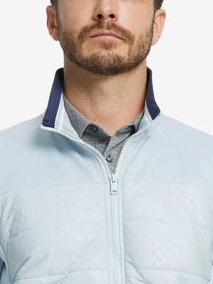 Close-up from nose to chest, showing collar detail and fleece texture of the Glacier Grey winter jacket.