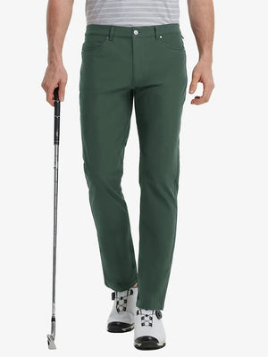 Front view of model wearing Stretch Plain Everyday Pants, athletic fit and minimal look – OLIVE GREEN