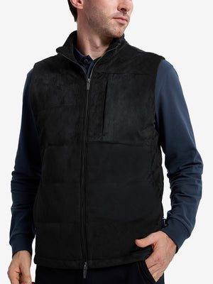 Front upper body shot of model wearing black classic micro suede leather puffer vest
