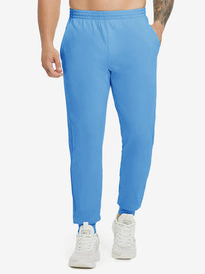 Model wearing Water Resistant Comfy Fleece Golf Joggers in sky blue, lower body front view