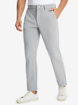 Front lower body shot of model wearing water-resistant stretch heat-tech winter trousers in light grey