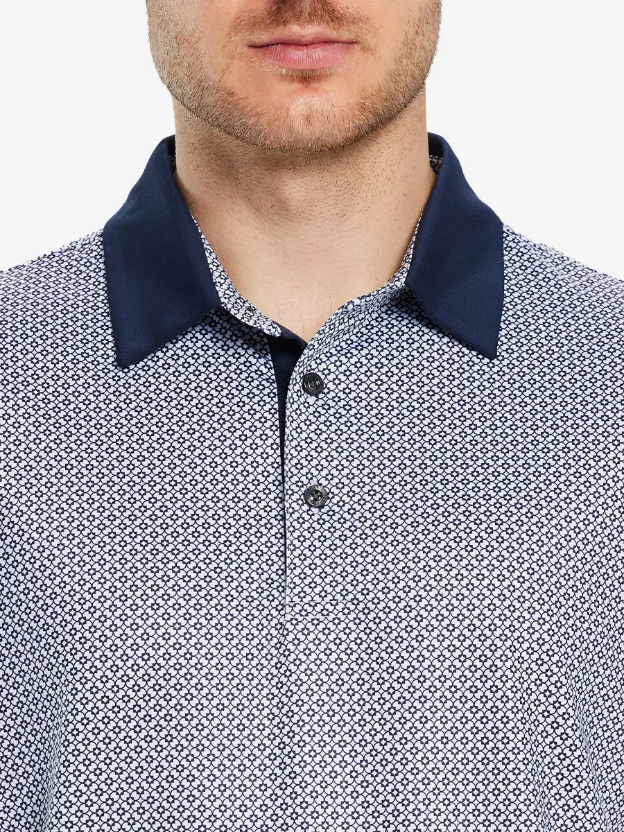 Model wears a WHITE NAVY INTERLINK  golf polo shirt, which emphasizes its cut and comfort when viewed from nose to chest