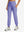 Model wearing women's stretch fleece lined water resistant joggers in lavender, showcasing the front lower body view.