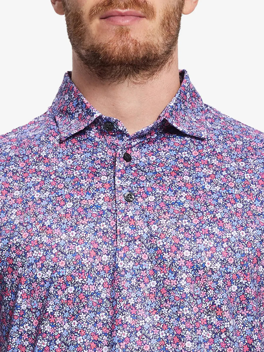 Colorful floral pattern polo shirt, model presents its vibrant colors and fine details, showcasing energy and elegance.