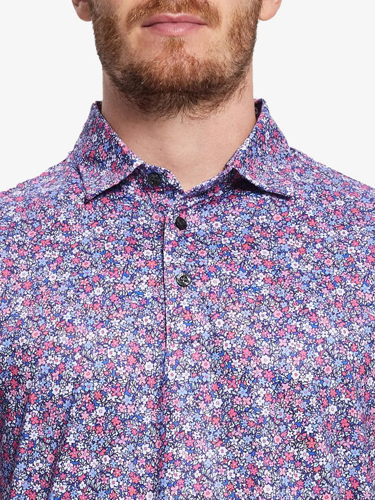 Colorful floral pattern polo shirt, model presents its vibrant colors and fine details, showcasing energy and elegance.