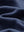 Close-up fabric detail of golf fleece winter puffer jackets, quilted texture and warm feel in navy