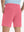 Back lower body view of model wearing the peach pink stretch soft flat front dress golf shorts, highlighting the rear design