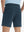 Back lower body view of model wearing the navy stretch soft flat front dress golf shorts, highlighting the rear design