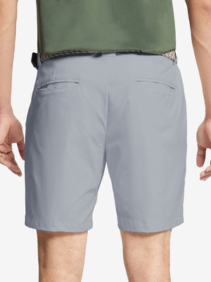 Back waist to knee view of grey water resistant golf 7 inch shorts, flexible performance fit.