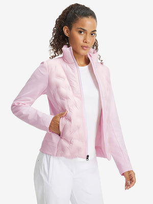 Model wearing women's lightweight fleece-lined puffer jacket, light pink, front upper-body look.