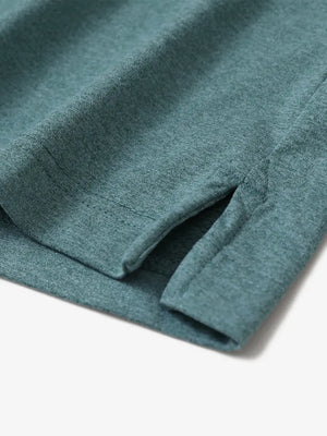 Aqua Heather Skin-friendly Long Sleeve Melange Polo – close-up detail of side hem slit