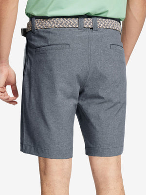 Back view of youth in navy Heather Performance Golf Shorts, highlighting rear design and fit