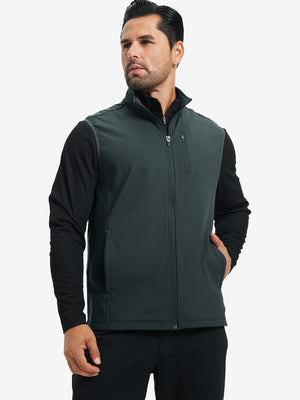 Model wearing water-resistant fleece golf vests, hand in side pocket, relaxed fit in dark grey