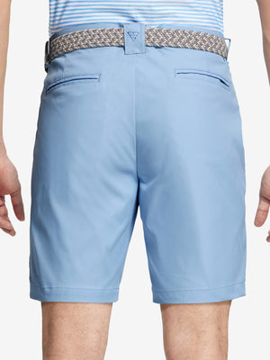 Back waist to knee view of light blue water resistant golf 9 inch shorts, flexible performance fit.