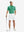Full-body front view of model wearing the white stretch soft flat front dress golf shorts for a complete look
