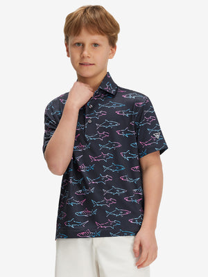 Front half-body of boy in ombre shark  performance print boys golf polo