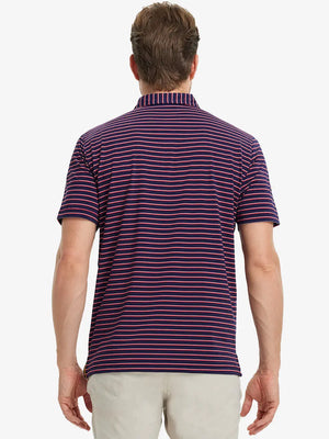 Rear half-body view of NAVY/RED STRIPE Polo styled for active performance