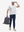 Model wearing navy superion softness mesh joggers with zipper pockets with a bag