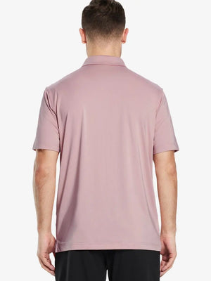 Back half-body view of male model wearing the Pale Pink Everyday Classic Solid Polo