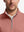 Front shot from nose to chest of model wearing brick melange  lightweight sleeveless quarter zip golf vest
