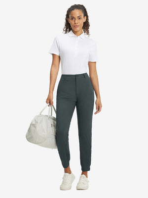 Woman wearing Women's Ultra-stretch Quick Dry Sweatpants with Ankle Zips in dark grey, full body front view