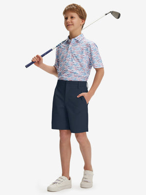 Full front: model in navy boys lightweight dry fit flat front golf shorts holding golf club.
