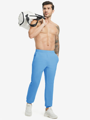 Full body front view of model wearing Water Resistant Comfy Fleece Golf Joggers in sky blue