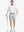 Full body front view of model wearing GLACIER GREY 7 Inch Heather Performance Golf Shorts, holding a golf club