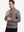 Front upper body view of model standing in red/black/white plaid full print quarter zip pullover, relaxed look.