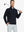 Half-body front view of model holding golf club wearing BLACK Premium Jacquard Quarter Zip Pullover.								
