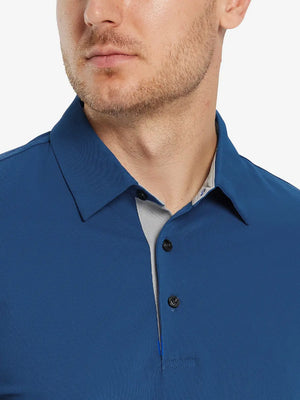 Model front close-up from nose to chest wearing BLUE Ventilated Pique Performance Polo