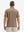 Back half-body view of model wearing the light brown ventilated pique performance polo, highlighting the rear silhouette