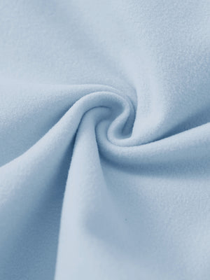 Close-up of the fabric of women's stretch fleece lined water resistant joggers in light grayish blue, highlighting the fleece lining.