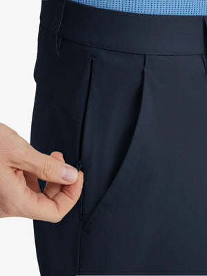 Close-up of right front pocket with zipper being opened on Player Fit Versatile Solid Shorts 7 Inch – NAVY