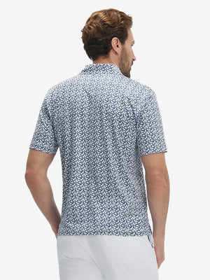 Back upper body view of model in Performance quick dry print golf polos with subtle white navy clouds tone