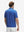 Back half-body view of model wearing the blue golf swing 4 way stretch print collared polo shirt, highlighting the rear silhouette