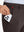 Side pocket detail of Golf Lightweight Fleece Lined Dress Pants in coffee brown, holding smartphone
