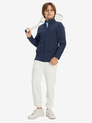 Full-body view of model wearing kids soft lightweight fleece lined jacket in navy, displaying the jacket's fit and design.
