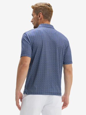 Back upper body view of model in Performance quick dry print golf polos with subtle navy white floral tone
