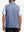 Back upper body shot of model wearing navy melange lightweight sleeveless quarter zip golf vest
