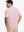 Back half-body view of model in PINK WHISKEY GLASS Popular Heather Print Polo