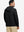 Back upper view of model wearing casual solid fleece hoodies pullover in black, showing smooth seams.