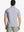 Back half-body view of GREY WHITE STRIPE Pinstripe Jersey Performance Polo worn by model								
