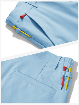 Waistband detail of lightweight flat front casual trousers in light blue, showing clean stitching.