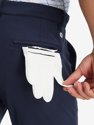 Back pocket detail of Golf Lightweight Fleece Lined Dress Pants in navy