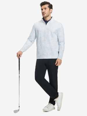 Model holding golf club in Full print lightweight quarter zip pullover with sporty grey irregular shape