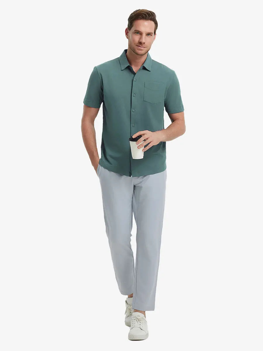 Full-body view of model holding takeaway drink cup in SEA MOSS Cotton Blend Plain Shirt.