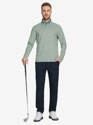 Man wearing Heather Pinstripe Brushed Dry Fit Quarter Zip Pullover in beryl green melange, holding golf club on course